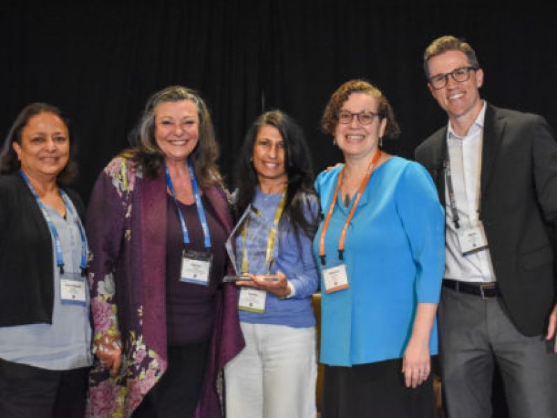 Group Photo of Astrata employees winning an award.